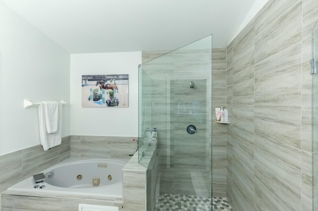 bathroom with separate shower and tub