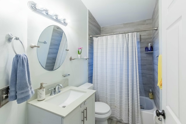 full bathroom with shower / bath combination with curtain, vanity, and toilet