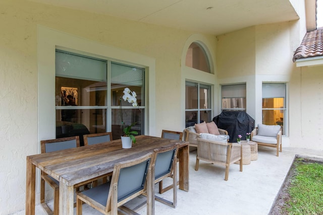 view of patio / terrace featuring an outdoor living space and grilling area