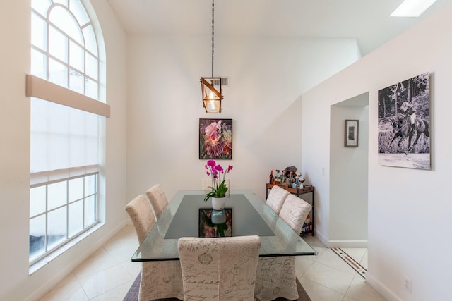 dining space with light tile patterned floors