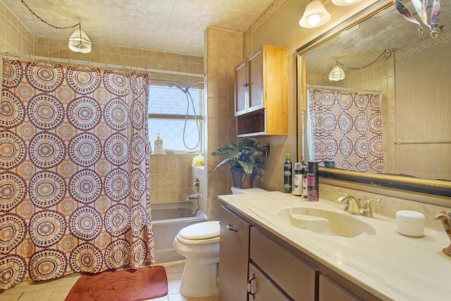 full bathroom featuring vanity, tile patterned flooring, shower / bath combo, and toilet