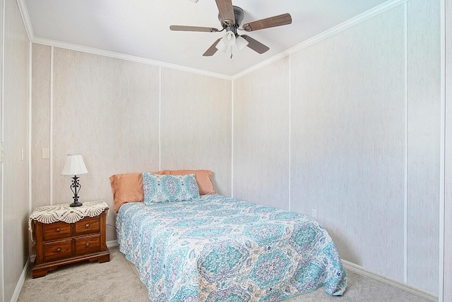 bedroom featuring ornamental molding, light colored carpet, and ceiling fan