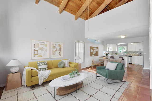 tiled living room featuring beamed ceiling, high vaulted ceiling, and wood ceiling