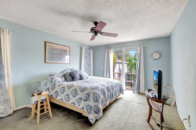 carpeted bedroom featuring a textured ceiling, access to exterior, and ceiling fan