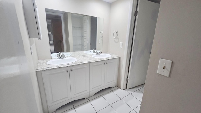 bathroom with vanity and tile patterned floors