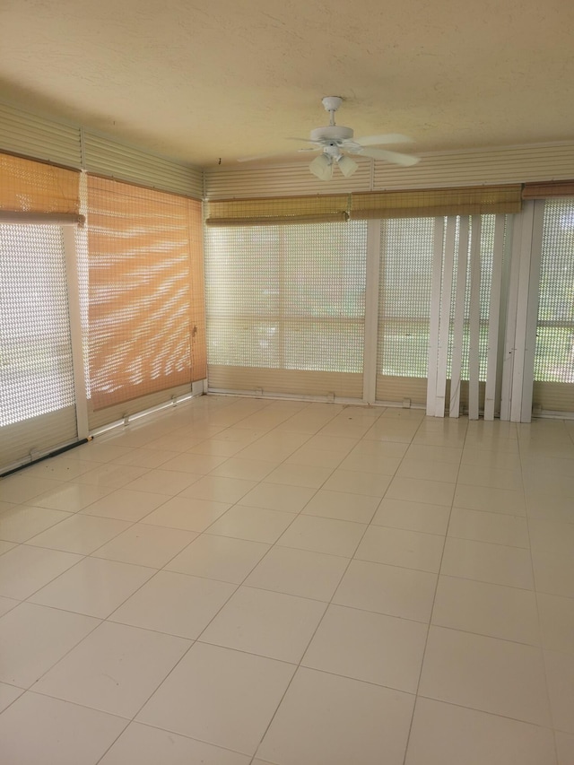 interior space featuring ceiling fan