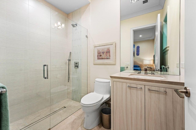 bathroom featuring tile patterned flooring, vanity, an enclosed shower, and toilet