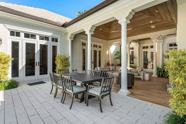 view of patio featuring outdoor lounge area and french doors