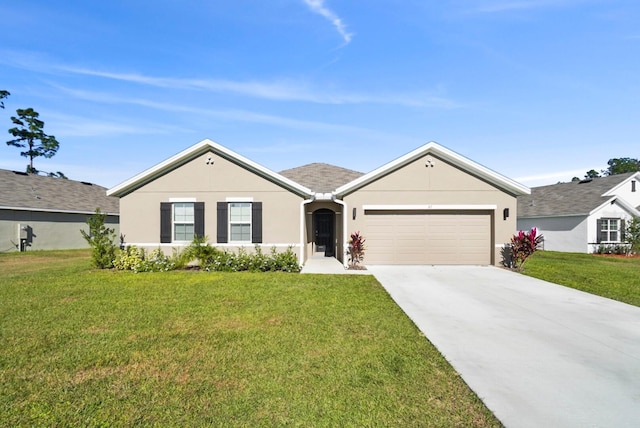 ranch-style house with a garage and a front lawn