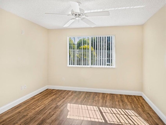 unfurnished room featuring hardwood / wood-style flooring, a textured ceiling, and ceiling fan