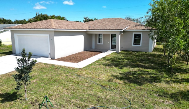 single story home with an attached garage, driveway, roof with shingles, and a front yard