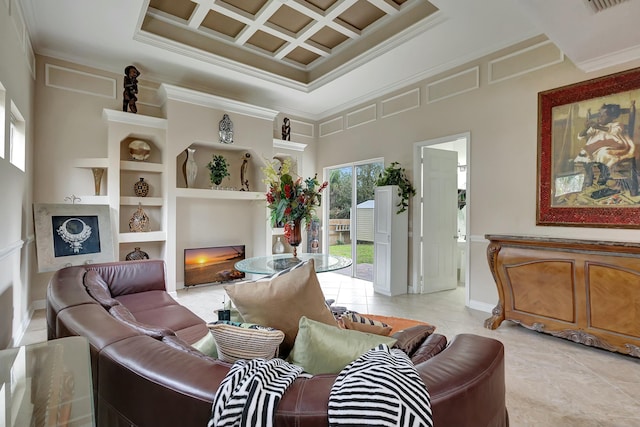 living room with built in shelves, a towering ceiling, crown molding, and light tile patterned floors