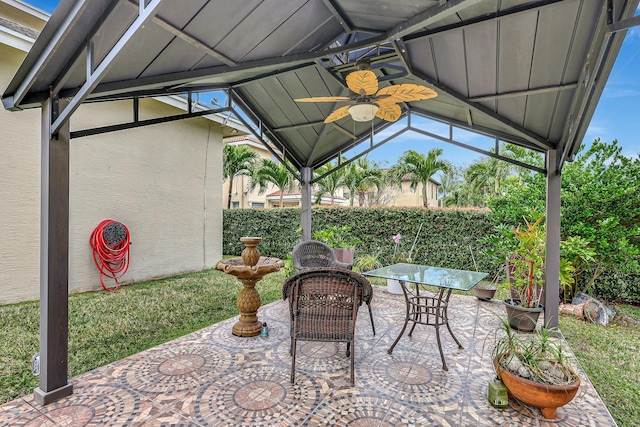 view of patio / terrace with a gazebo and ceiling fan