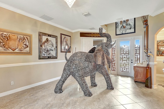 interior space with crown molding