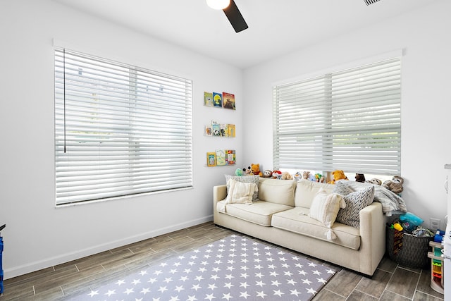 living room featuring ceiling fan