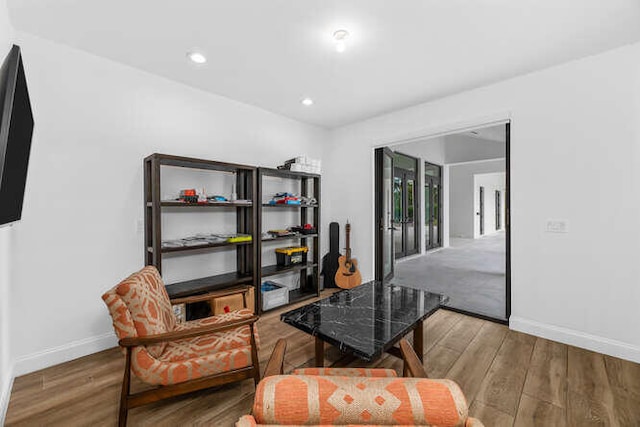 office area with hardwood / wood-style flooring