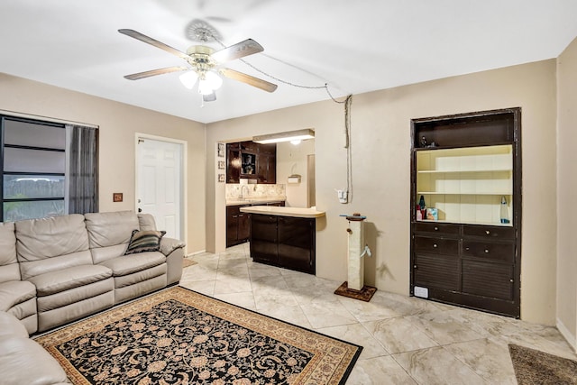 living room with ceiling fan