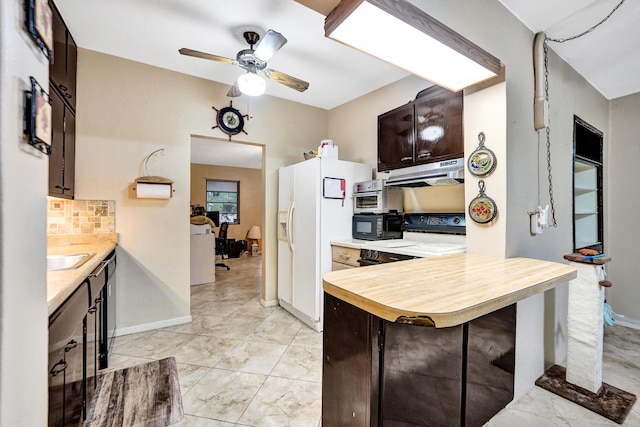 kitchen with ceiling fan, backsplash, dark brown cabinetry, black appliances, and kitchen peninsula