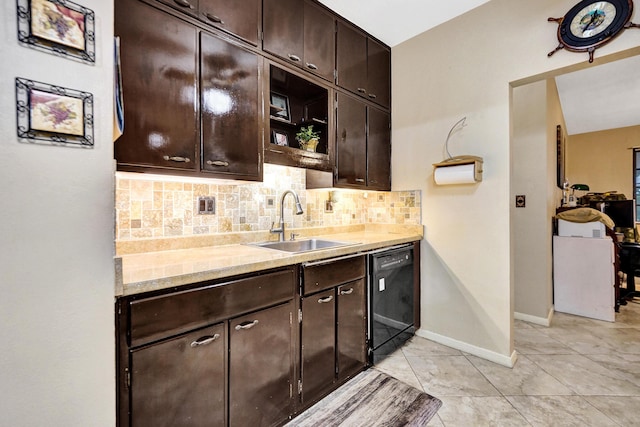 kitchen with sink, decorative backsplash, dark brown cabinets, and dishwasher