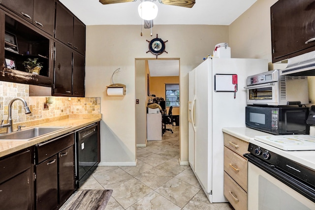 kitchen with black appliances, sink, backsplash, ceiling fan, and dark brown cabinetry