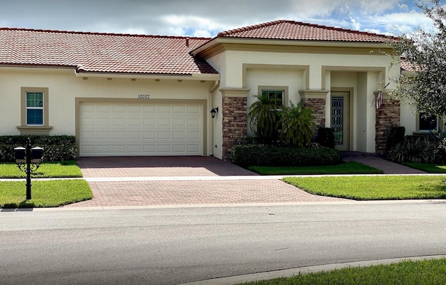 mediterranean / spanish-style house featuring a garage