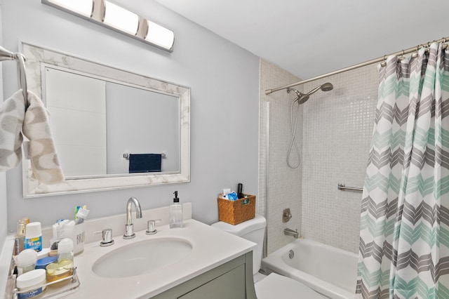 full bathroom with vanity, toilet, and shower / bath combo