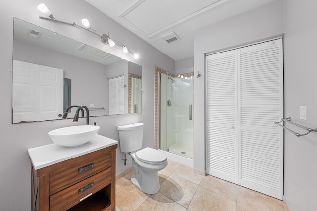 bathroom with walk in shower, tile patterned floors, toilet, and vanity