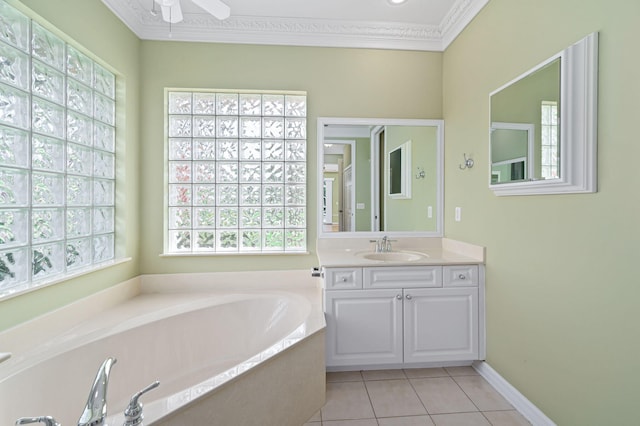 bathroom featuring ceiling fan, tile patterned flooring, vanity, ornamental molding, and a bathing tub