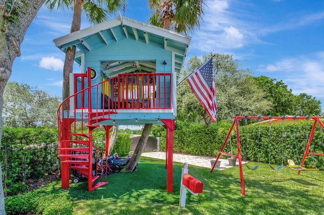 view of play area featuring a lawn