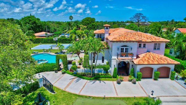 view of front of property featuring a balcony