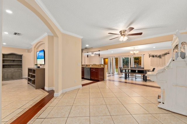 interior space with crown molding, a notable chandelier, a textured ceiling, and light tile patterned floors