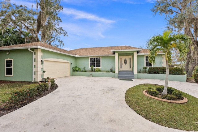 ranch-style house with a garage