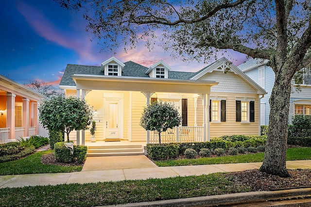 view of front of house featuring covered porch