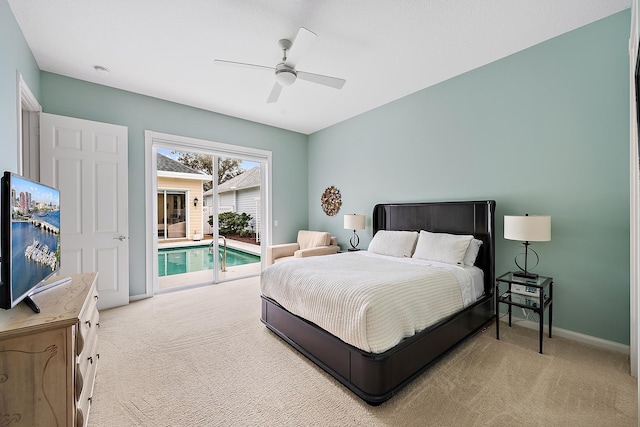 carpeted bedroom with access to outside and ceiling fan