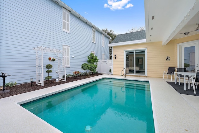 view of pool featuring a patio area and a pergola