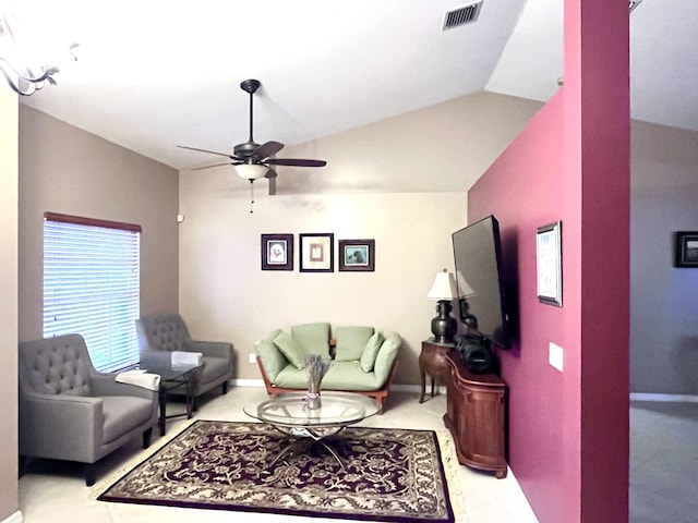 living room featuring lofted ceiling and ceiling fan