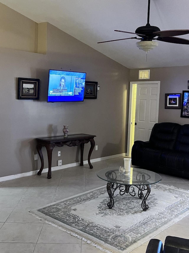 tiled living room with ceiling fan