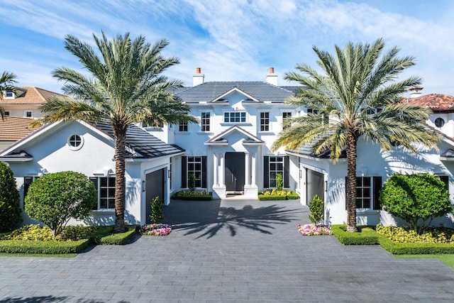 view of front of property featuring a garage