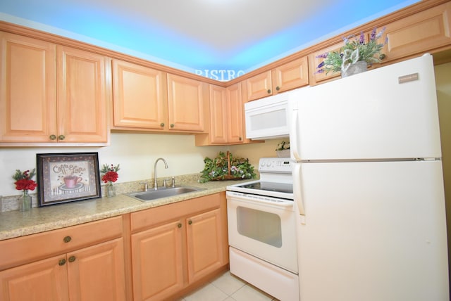 kitchen featuring light tile patterned flooring, sink, light brown cabinets, and white appliances