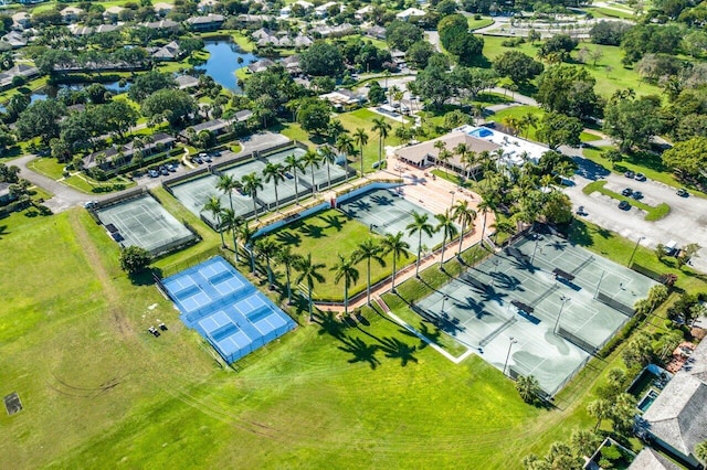 birds eye view of property featuring a water view