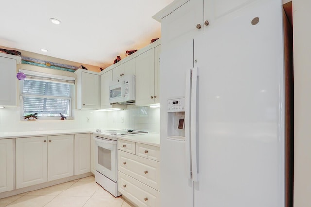 kitchen with tasteful backsplash, white cabinetry, light tile patterned flooring, and white appliances