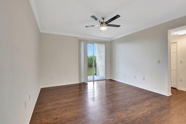 spare room featuring crown molding, ceiling fan, and dark hardwood / wood-style flooring