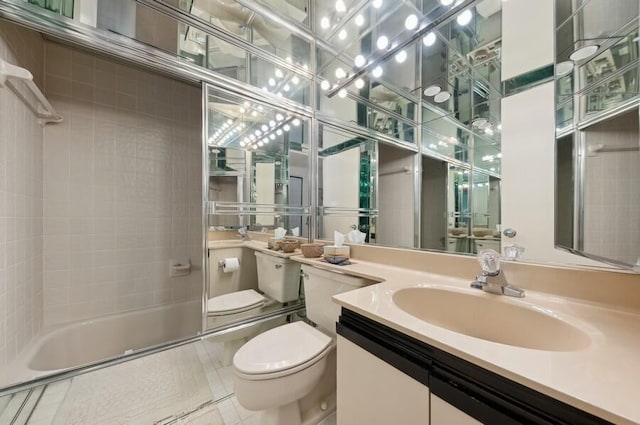 full bathroom with vanity, toilet, tiled shower / bath combo, and tile patterned flooring