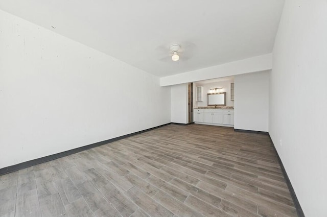 spare room with light hardwood / wood-style flooring