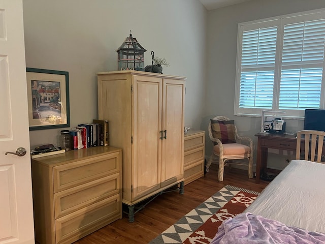 bedroom featuring dark hardwood / wood-style floors