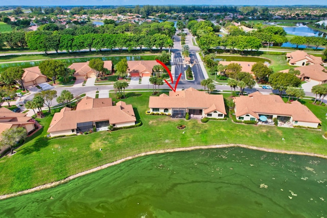 drone / aerial view featuring a water view