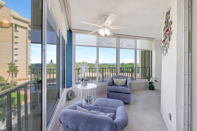 sunroom / solarium with ceiling fan