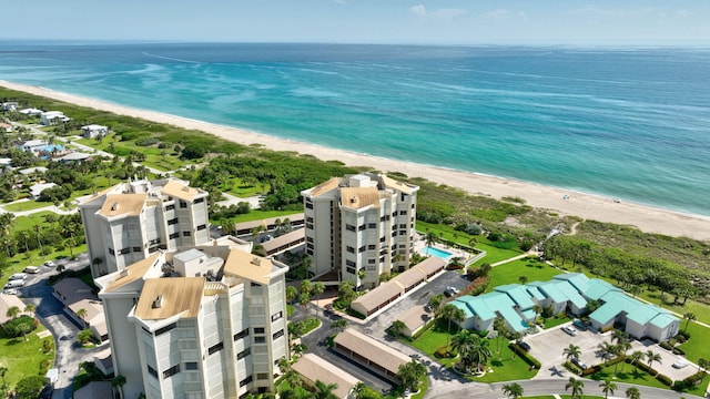 aerial view with a view of the beach and a water view