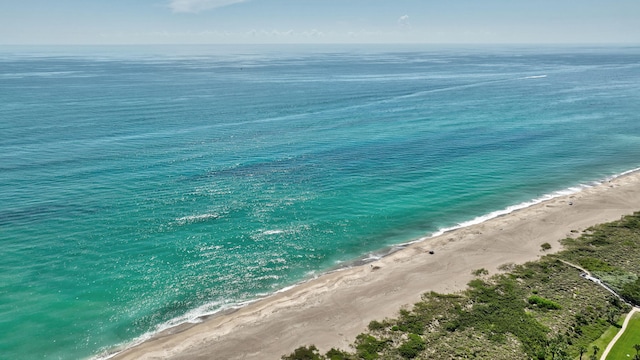 view of water feature with a beach view