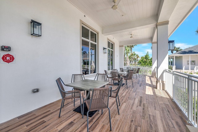 wooden terrace with ceiling fan